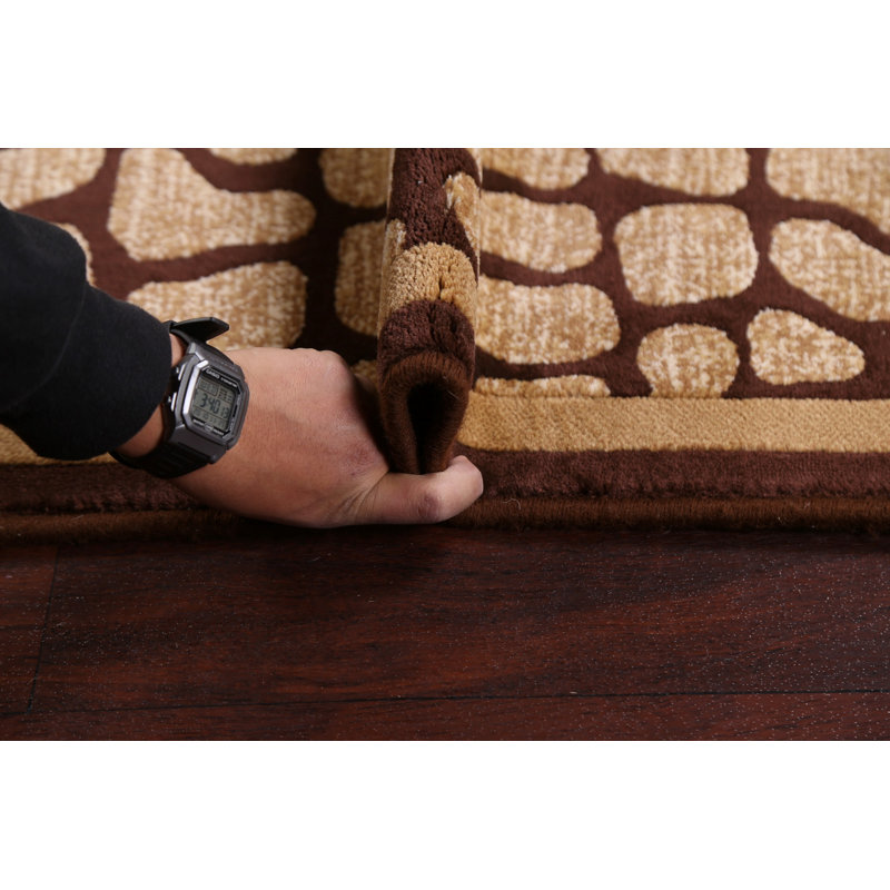 Tapis de couloir à motif géométrique brun