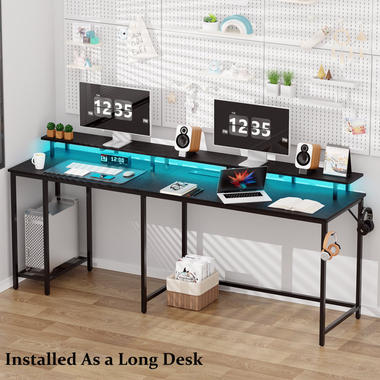 https://assets.wfcdn.com/im/17375051/resize-h755-w755%5Ecompr-r85/2493/249353776/Kamai+54%22+L+Shaped+Computer+Desk+for+Home+Office+Gaming+Desk+with+LED+Built-in+Outlets+with+Storage+Shelf.jpg