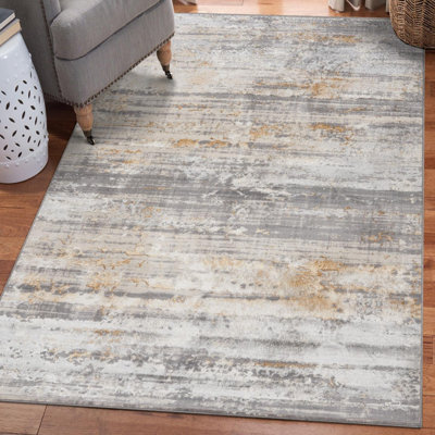 Tapis abstrait doré / gris Selen