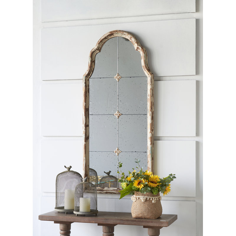 Miroir arqué mauresque avec cadre antique et motif quadrillé