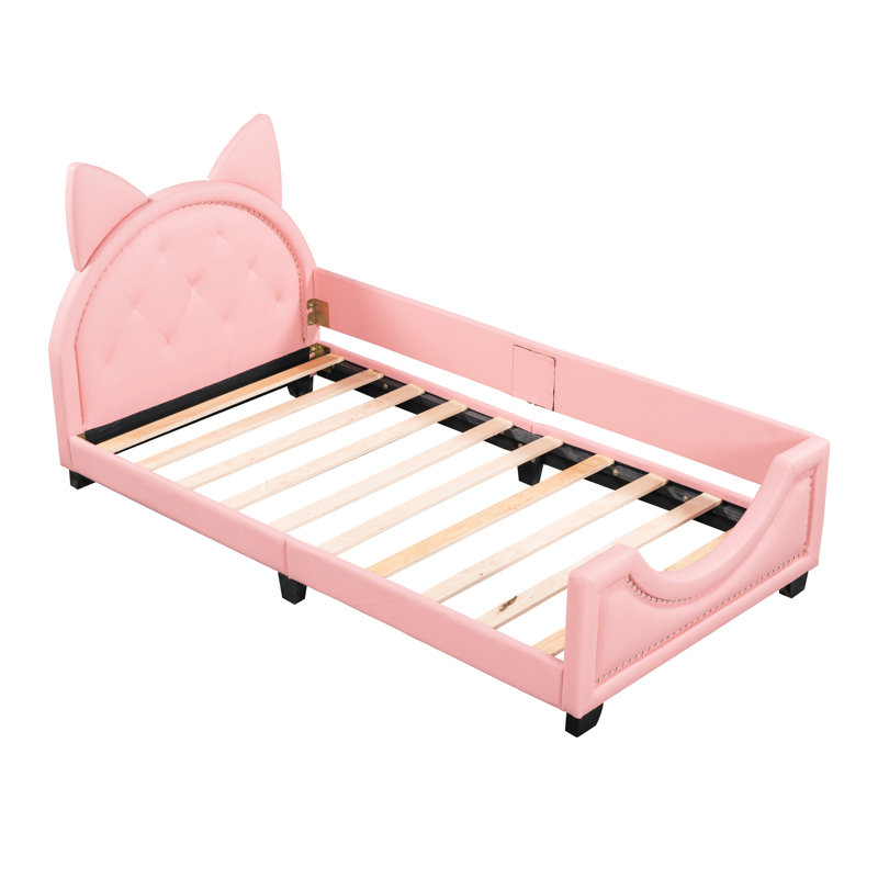 Lit de jour rose simple avec revêtement adorable et tête de lit avec oreilles de carton