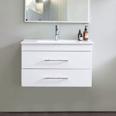 Meuble-lavabo mural de 81 cm (32 pouces) avec double tiroir, système de fermeture amortie et lavabo en céramique pour salles de bains modernes et minimalistes.
