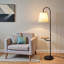 Lampe sur pied noire avec table en bois intégrée et interrupteur rotatif