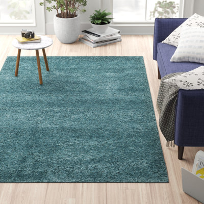 Tapis bleu turquoise Delane