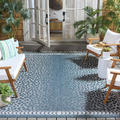 Tapis d'intérieur / extérieur à imprimé animal Aidah Performance