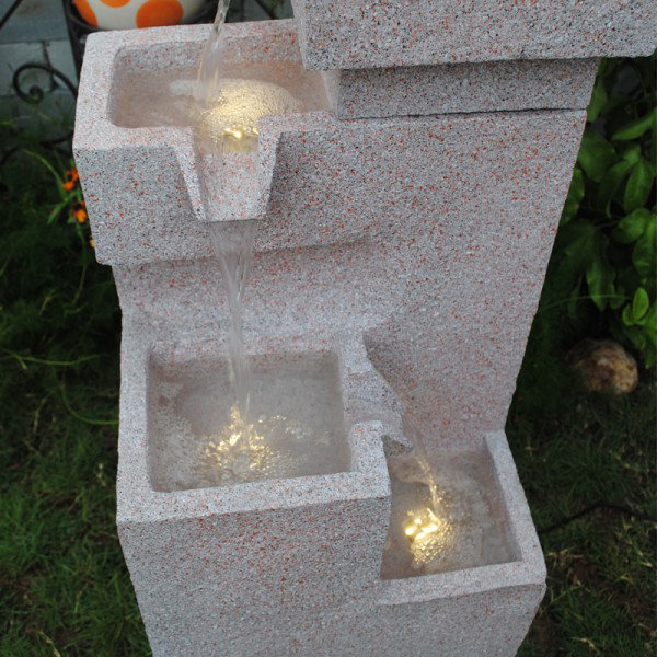 Fontaine de cascade de pneus imitation résine en pierre de sable avec lumière