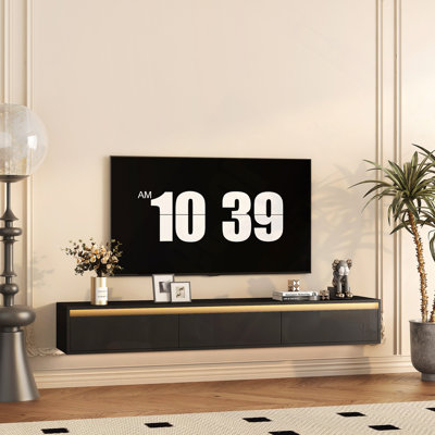 Floating TV Stand, Wall Mounted TV Shelf With Led Lights & Power Outlet,High Gloss TV Cabinet For Black Tv Stands For Living Room by Ivy Bronx