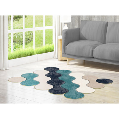 Tapis beige / noir / bleu en polyester tissé à la machine Novelty Mooreland