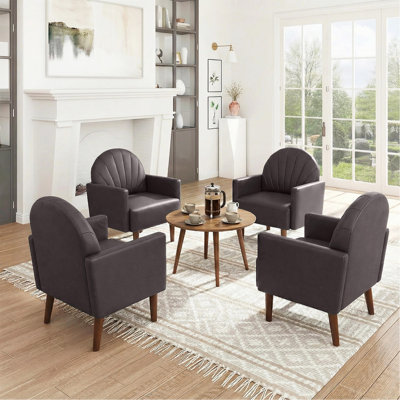 Un fauteuil contemporain en forme de coquillage avec un revêtement en cuir de polyuréthane et des pieds en bois, idéal pour les salons, les balcons, les chambres d'enfants et les bureaux.