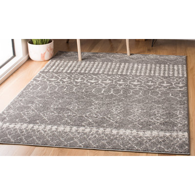 Manriquez Geometric Area Rug
