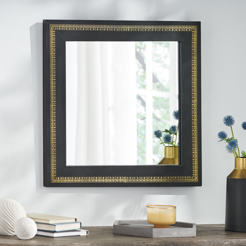 Miroir mural clouté en cuir