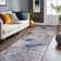 Chartier Machine Woven Floral Area Rug