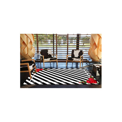 Tapis décoratif à rayures géométriques roses et noires