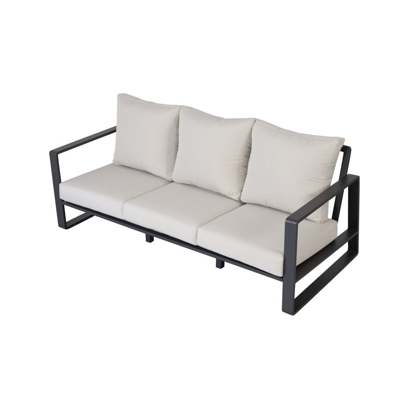 Combinaison moderne et table basse - Coussins beiges avec détails en aluminium brun pour un cadre relaxant, contemporain et solide, facile à nettoyer
