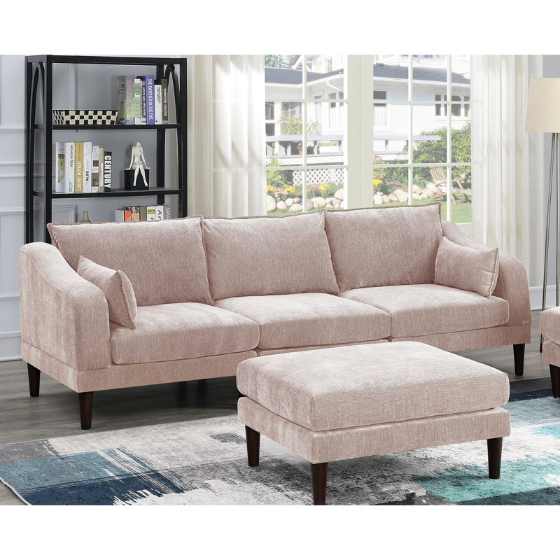 Canapé d'angle rose poudré 5 pièces, style moderne et modulable, avec coussins de soutien pour le dossier.