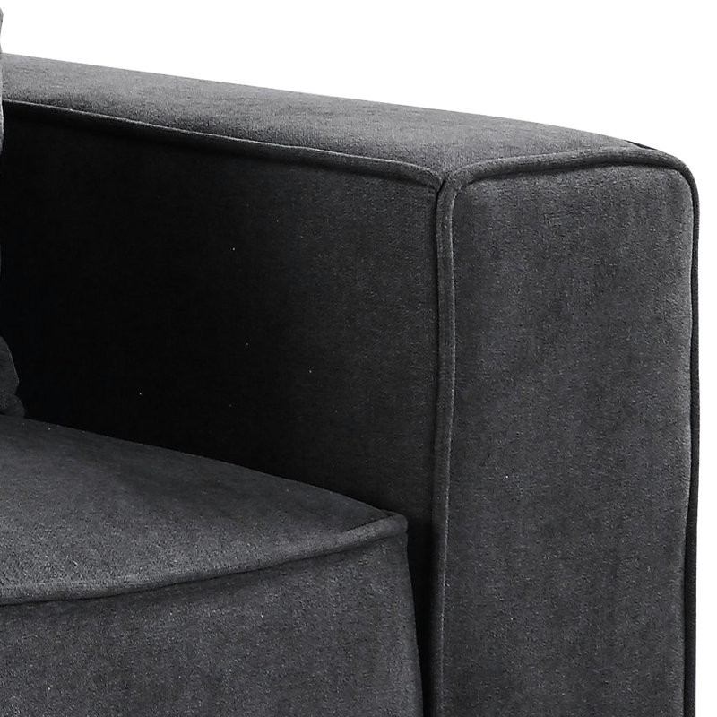 Fauteuil gris avec dossier confortable et ajustable, coussins polyvalents