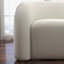 Fauteuil demi-tonneau pivotant rembourré Coyle-1867919385-1837077994