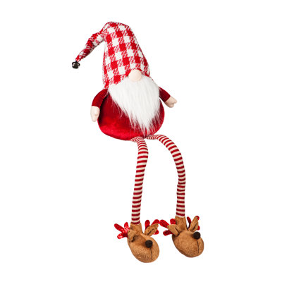 Gnome en tissu avec des pieds pendants et des pantoufles de renne