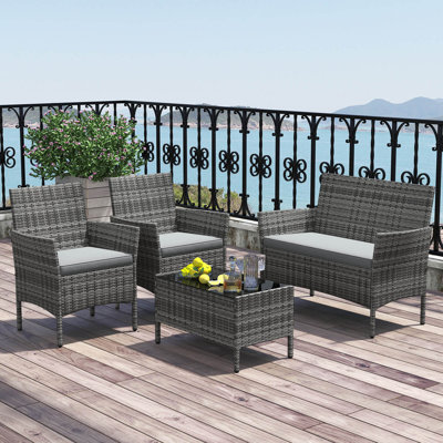 Ensemble de meubles de patio 4 pièces avec coussins lavables et table basse en verre trempé rouge