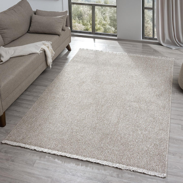 Tapis texturé à franges