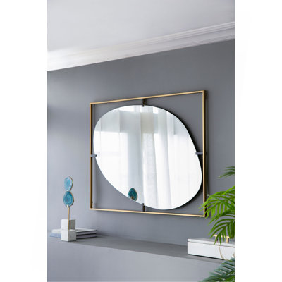 Miroir coquelicot avec cadre en métal doré