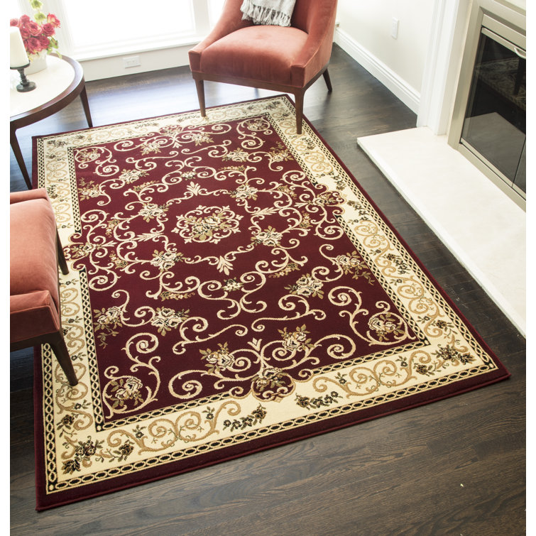 Tapis Souvanerie rouge à motif floral doré Gloucester