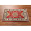 Tapis décoratif géométrique rouge Kazak
