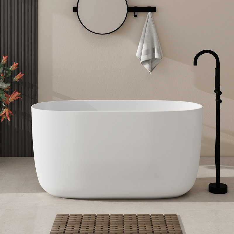 Baignoire de trempage en résine à surface solide de 47 po avec trop-plein et drain escamotable