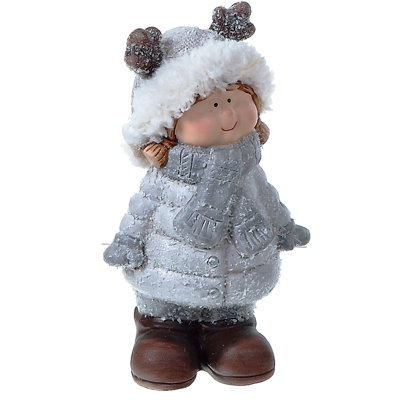 Résine debout dans un manteau d'hiver