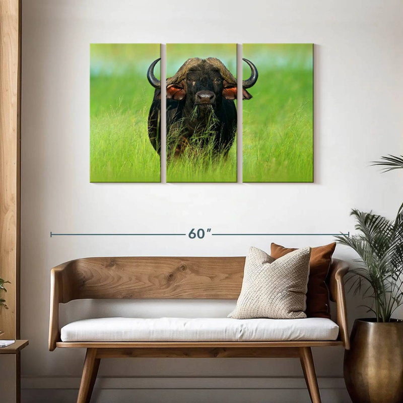 Brampt mangeant un bison, H 28 po x l 45 po