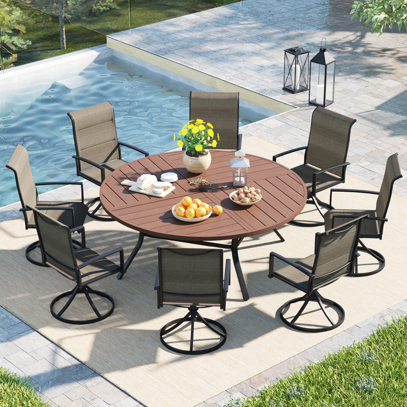 Ensemble de salle à manger de patio avec table de salle à manger ronde en métal de 60 po et 8 chaises pivotantes rembourrées en textilène