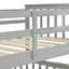 Lit simple superposé au dessus d'un lit double avec tiroirs de rangement, lit superposé en bois avec échelle et garde-corps gris-207936066