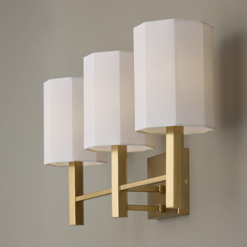 24.25" W x 11.25" H 3-Light Vanity in Aged Brass with Octagonal White Fabric Shades
