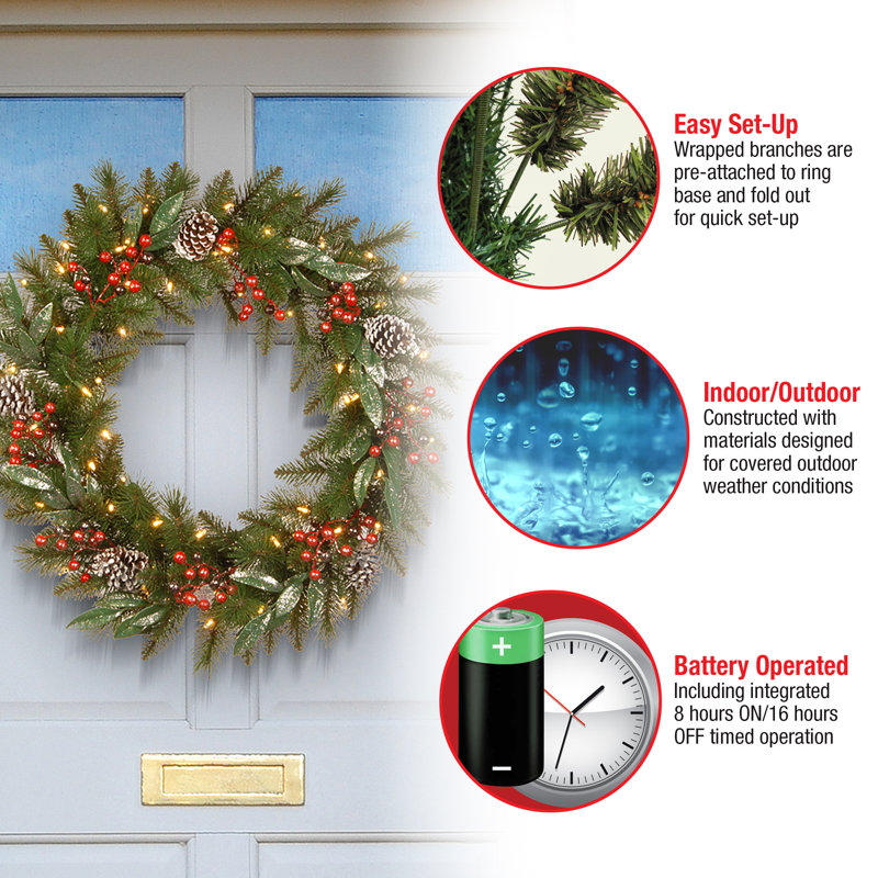 The Holiday Aisle® Frosted Pine Berry Wreath with Battery Operated LED Lights, 24" H x 24" W x 4" D