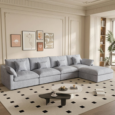 Slipcovered Upholstered Modular Sofa With Ottoman