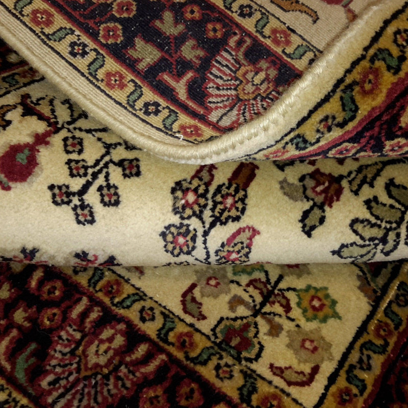 Panchita Hand Woven Cotton and Wool Floral and Oriental Area Rug