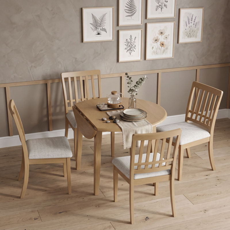 Ensemble de salle à manger extensible rond 5 pièces avec rallonges et quatre chaises rembourrées à dossier à lattes pour petits appartements