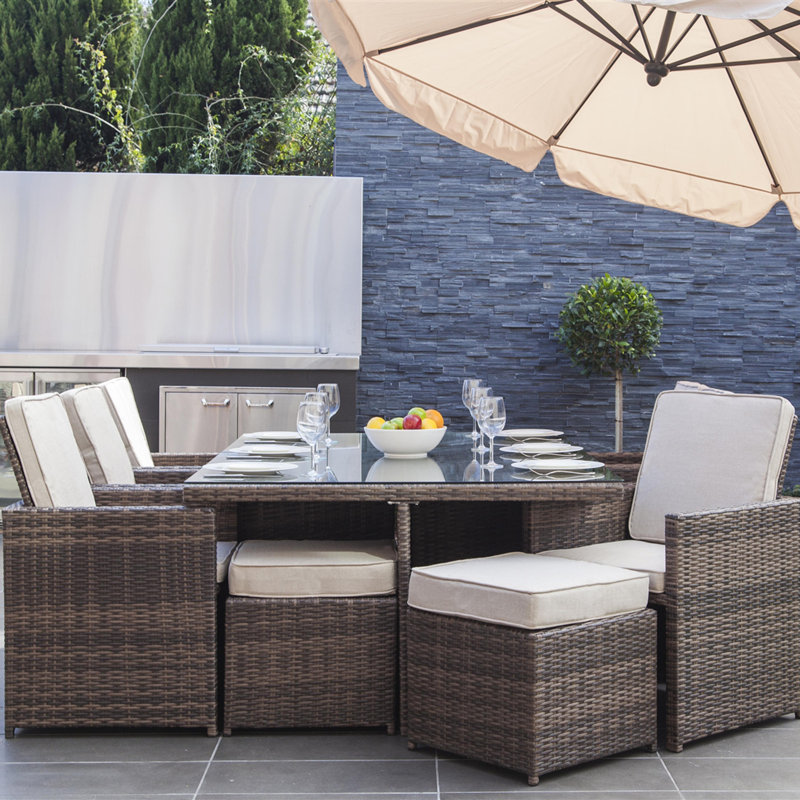 Rivoli 6 - Person Wicker Patio Dining Set with Rectangular Table , Cushions Included, Brown