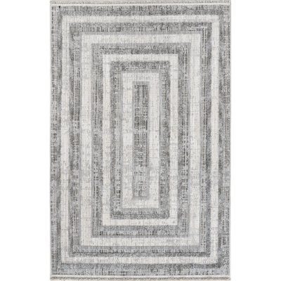 Violette Casual Bordered Tasseled Area Rug