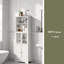Grande armoire de rangement blanche avec tablettes et portes pour la salle de bain