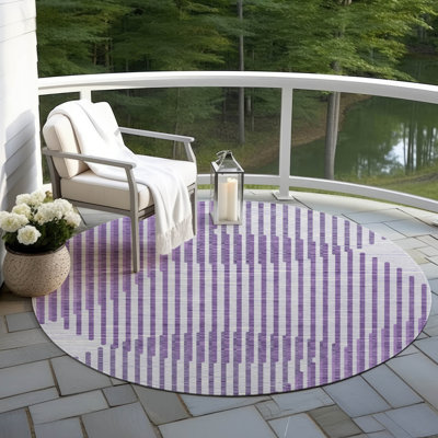 Tapis intérieur / extérieur mauve Elowen 