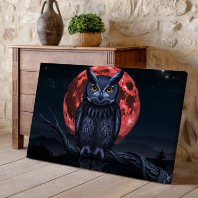 Toile, un majestueux hibou perché sur une branche torsadée illuminée par un art mural