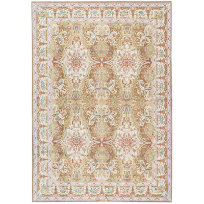Tapis doré de haute qualité noué à la main