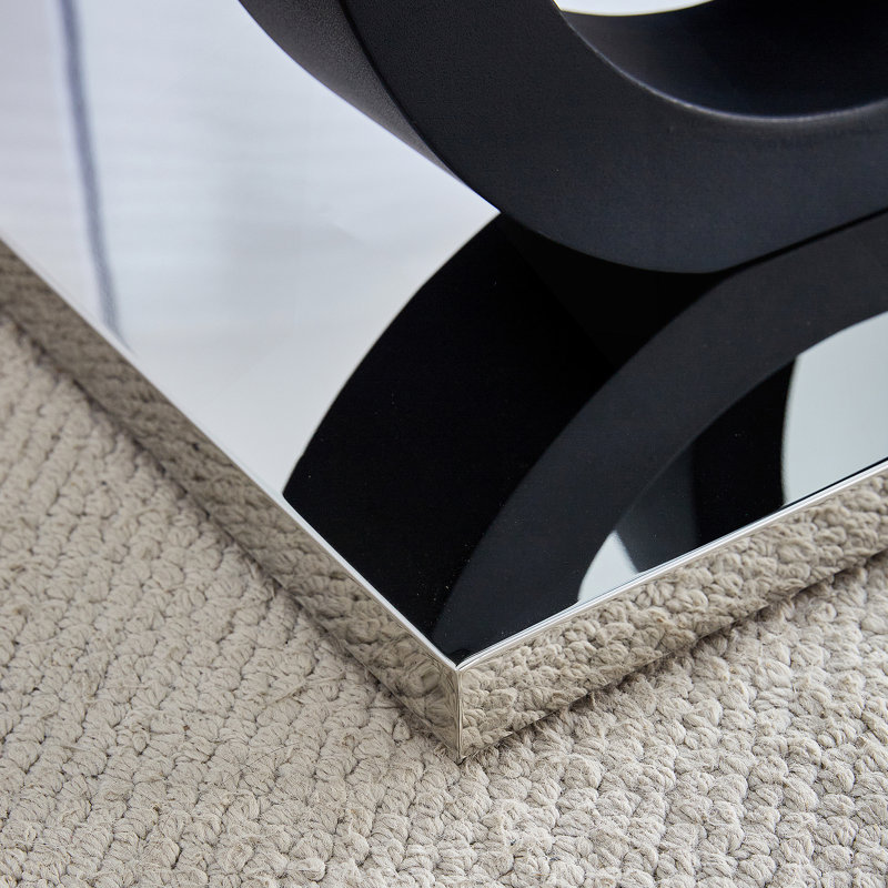 Table basse de style moderne avec plateau en panneau de fibres à densité moyenne et base noire convenant aux salons et aux salons