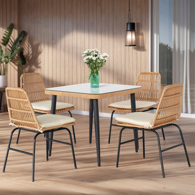 Kuwan 4-Person Square Outdoor Dining Set with Cushions by Corrigan Studio