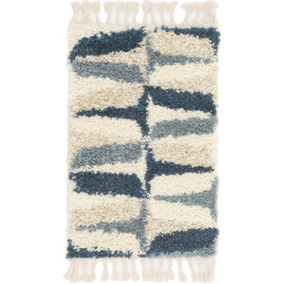 Tapis bleu à motif géométrique Mitzy