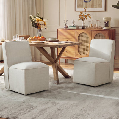Chaises de salle à manger rembourrées modernes avec roulettes et chaises d'appoint en chenille sans accoudoirs pour le salon (ensemble de 2)