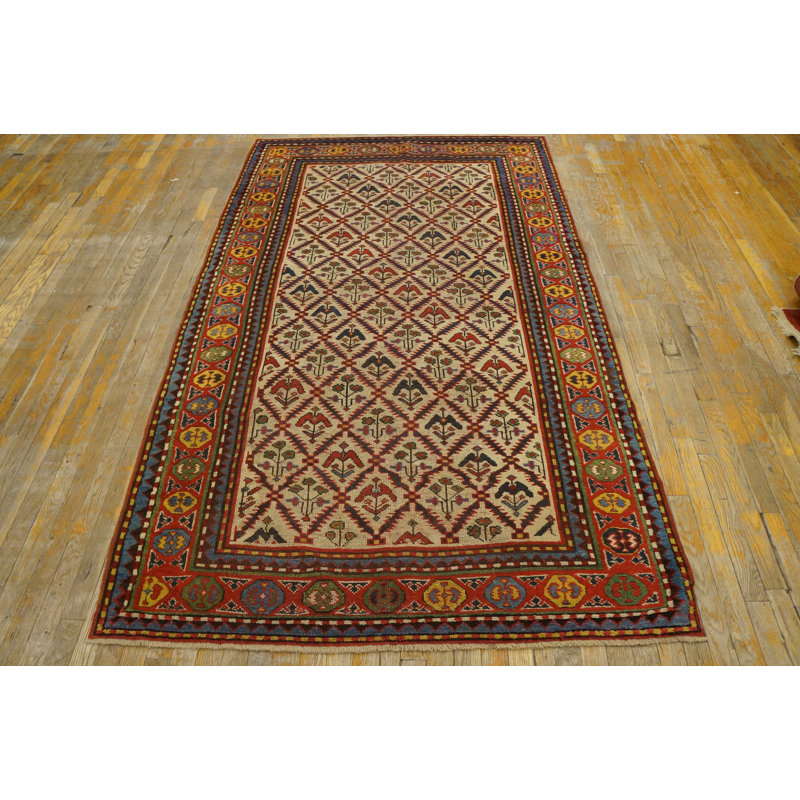 Tapis ivoire antique de style Kazak