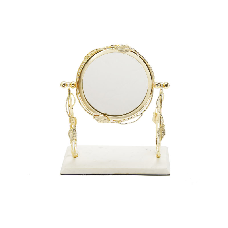 Miroir de table avec bordure à motif de feuilles et base en marbre blanc
