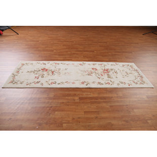 https://assets.wfcdn.com/im/17599628/resize-h310-w310%5Ecompr-r85/1799/179979506/handmade-hand-knotted-wool-beige-rug.jpg